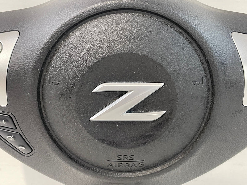 Load image into Gallery viewer, 2009 - 2020 NISSAN 370Z LEFT DRIVER SIDE STEERING WHEEL AIRBAG AIR BAG W/O NAVIGATION # 92424