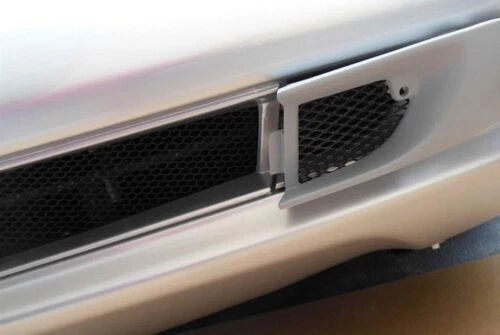 Load image into Gallery viewer, 1997-2002 Mercedes SL AMG Style Lower Front Bumper Grill / Left Tow Hook Cover
