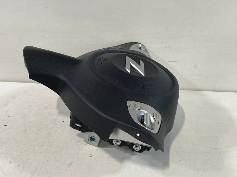 Load image into Gallery viewer, 2009 - 2020 NISSAN 370Z LEFT DRIVER SIDE STEERING WHEEL AIRBAG AIR BAG W/O NAVIGATION # 92424

